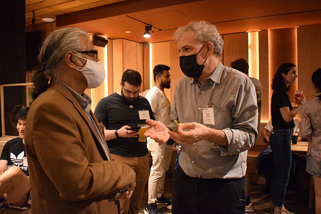 faculties talking in meetup